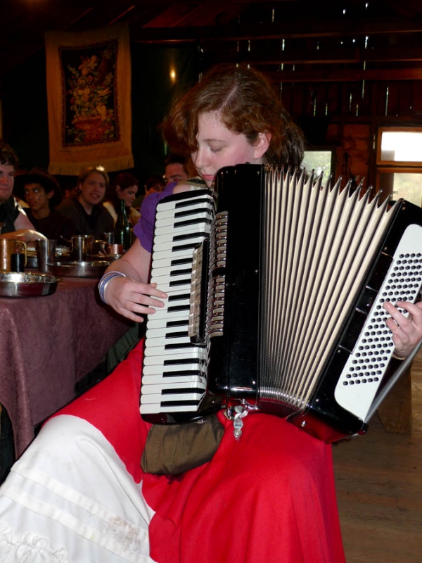 Casmina Playing an Accordian